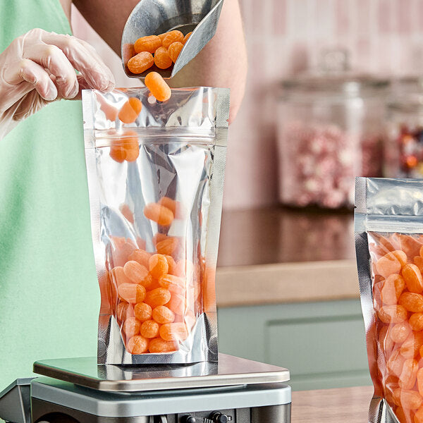 5" x 8 1/2" 3 Mil Silver Metallized / Clear Plastic Zip Top Stand-Up Pouch with Hanging Hole