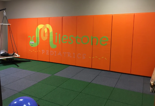 CUSTOM WOOD BACKED GYM WALL PADDING PANELS 2' X 7'