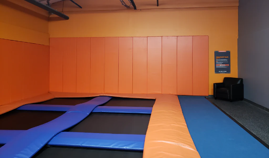 CUSTOM WOOD BACKED GYM WALL PADDING PANELS 2' X 8'